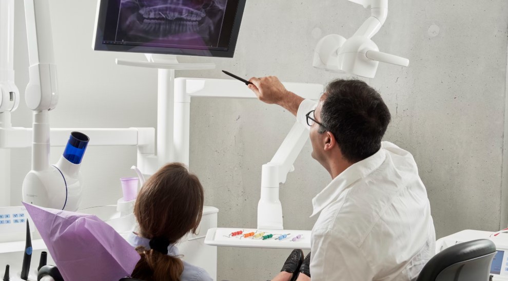 dentist discussing biomimetic dentistry