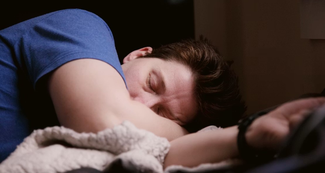 man with sleep apnea snoring