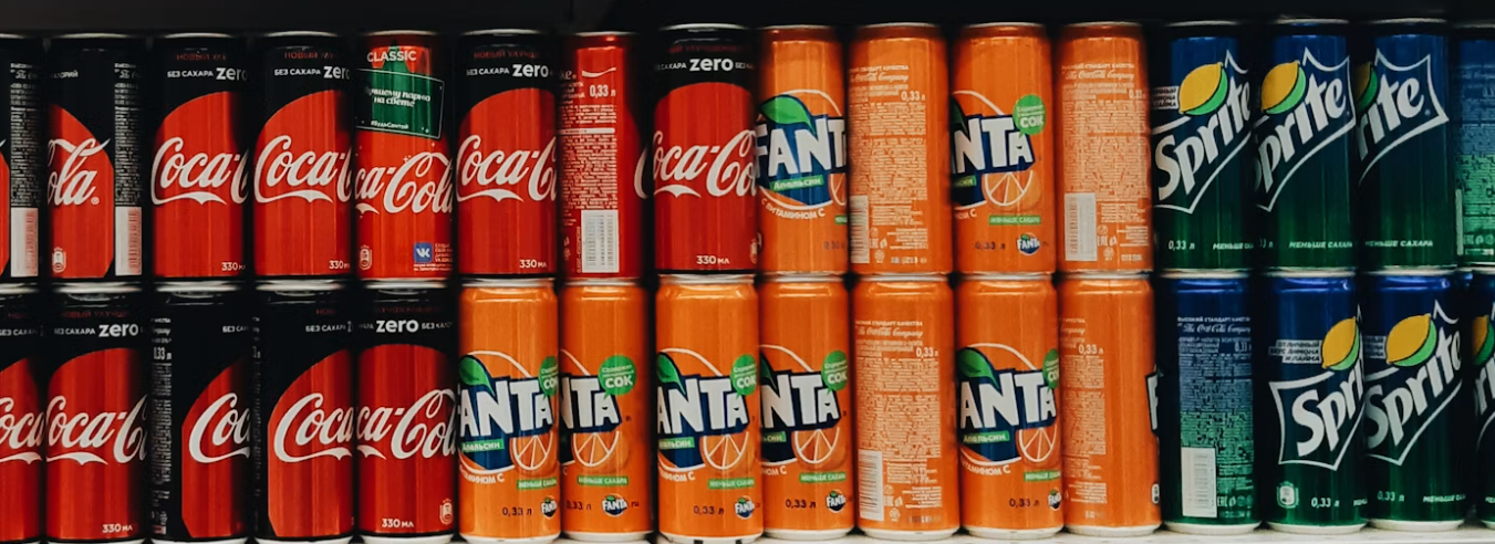 soda cans on shelf